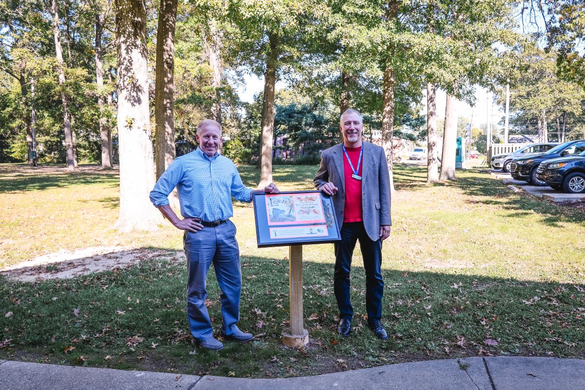 Pictured: Mayor Don Walters and Library Director Andrew Harant at the Lions Park StoryWalk® in Cuyahoga Falls.